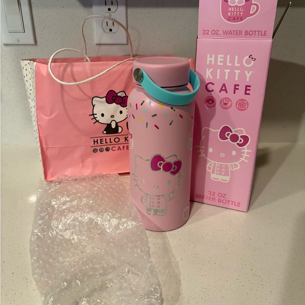 NWT Hello Kitty Cafe Pink Water Bottle with Sprinkles and macarons 32 oz.
